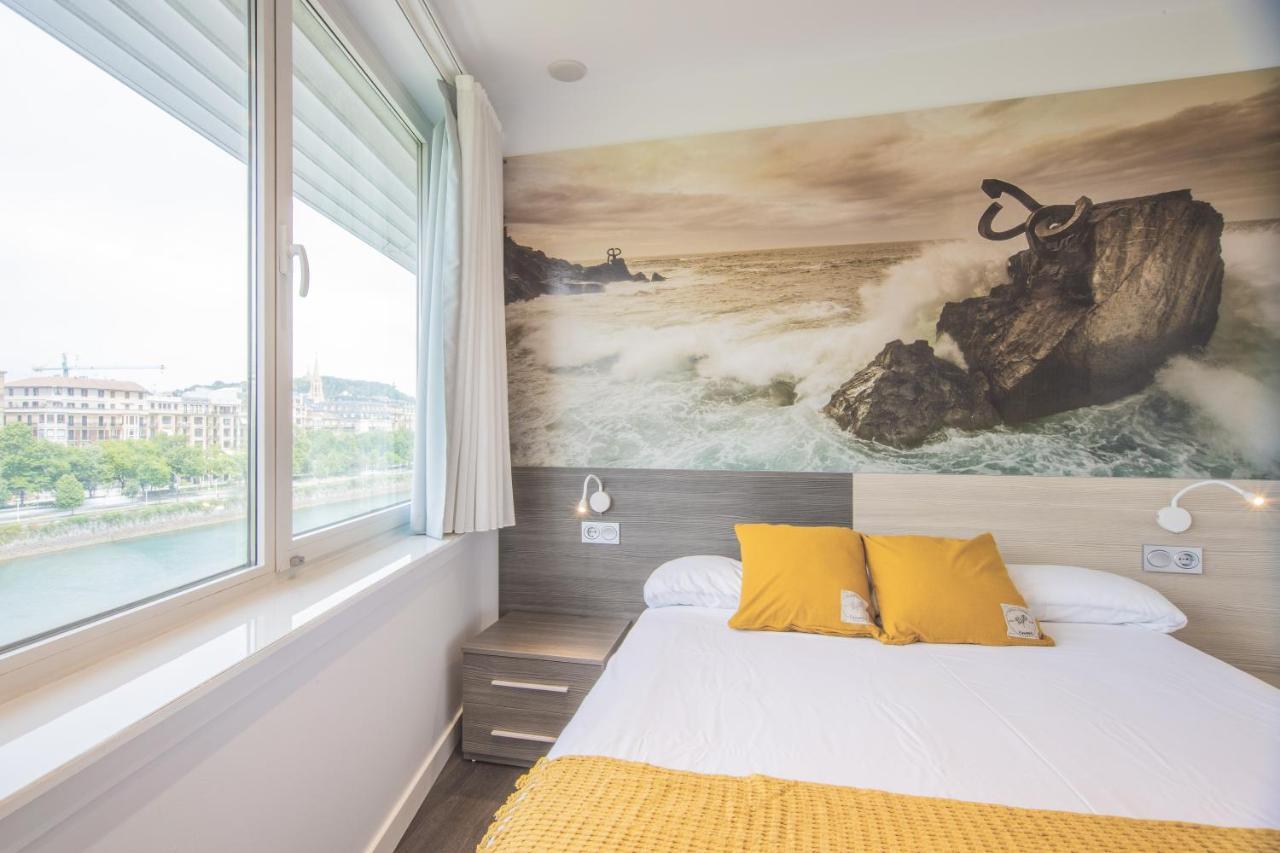 Kamer met 1 of 2 Bedden en Uitzicht op de Rivier