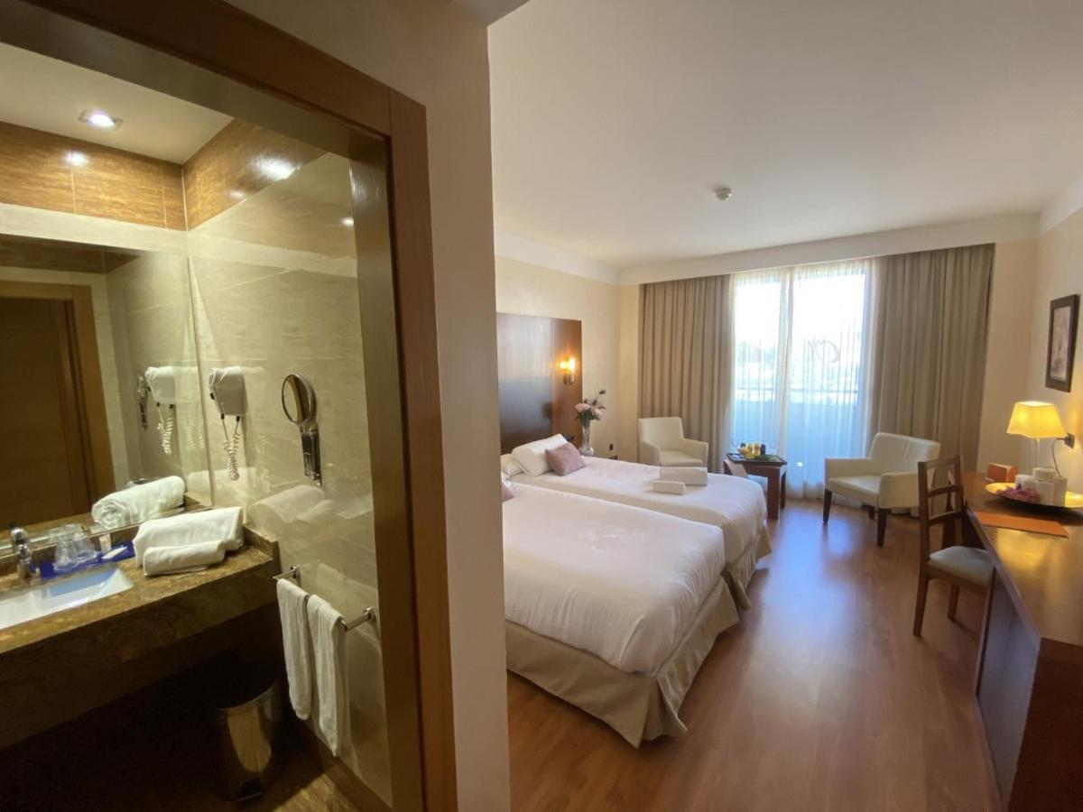 Habitación Doble con cama supletoria - 1 o 2 camas
