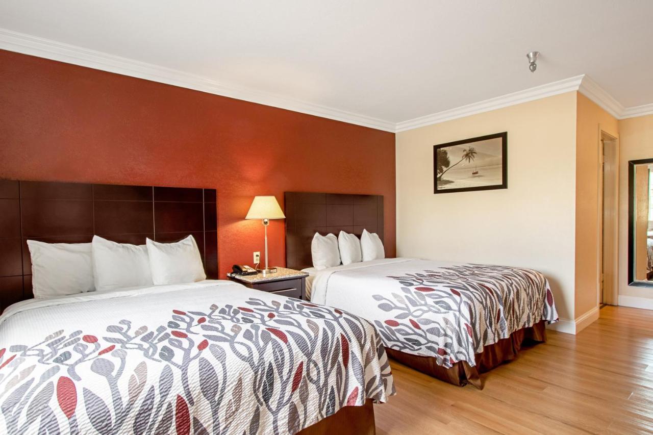 Suite with Two King Beds Fireplace and Spa Bath Non-Smoking