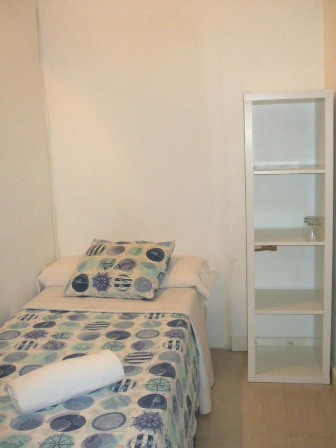 Quarto Triplo com Casa de Banho Partilhada