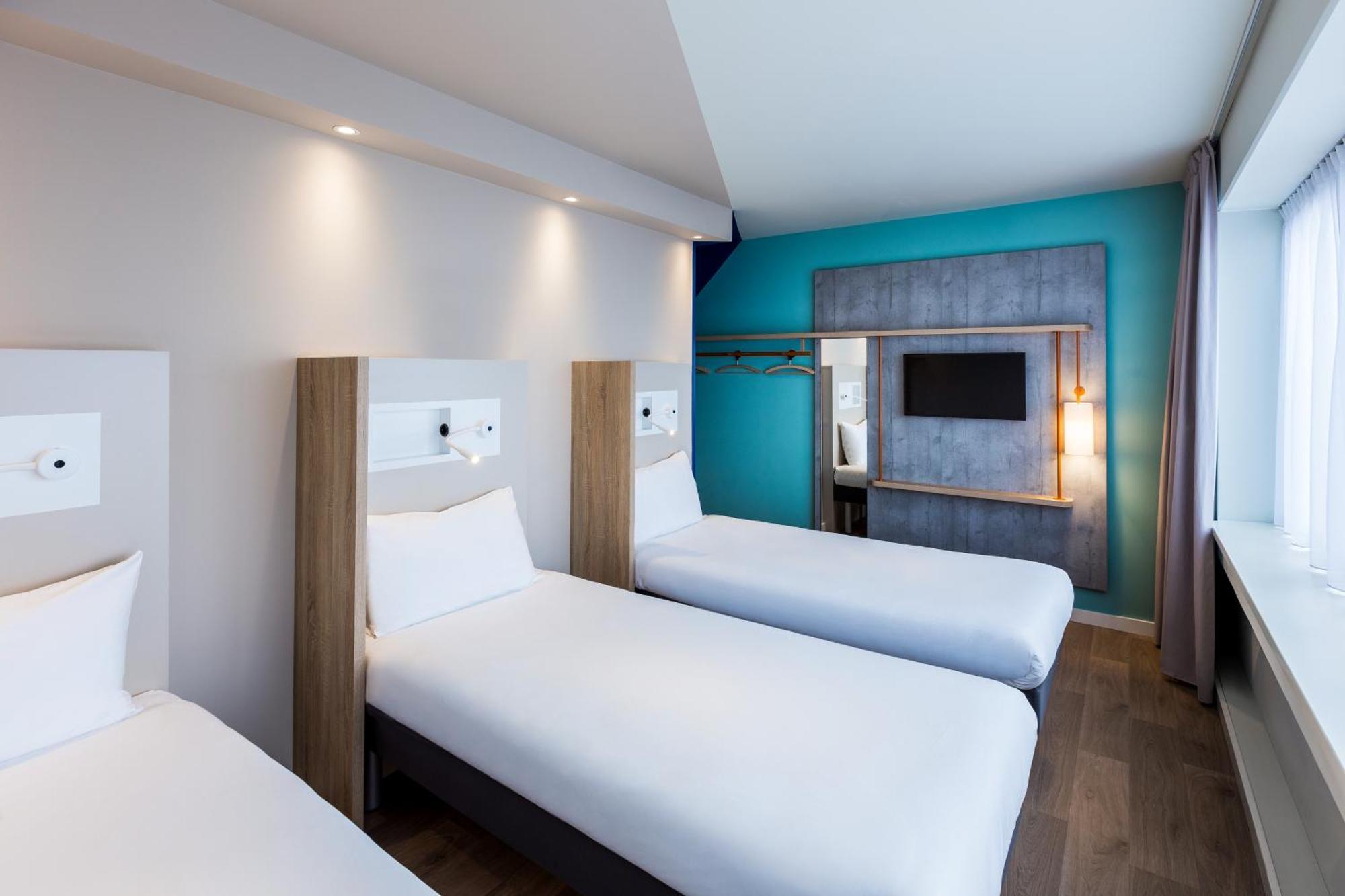 Room Three Single Beds