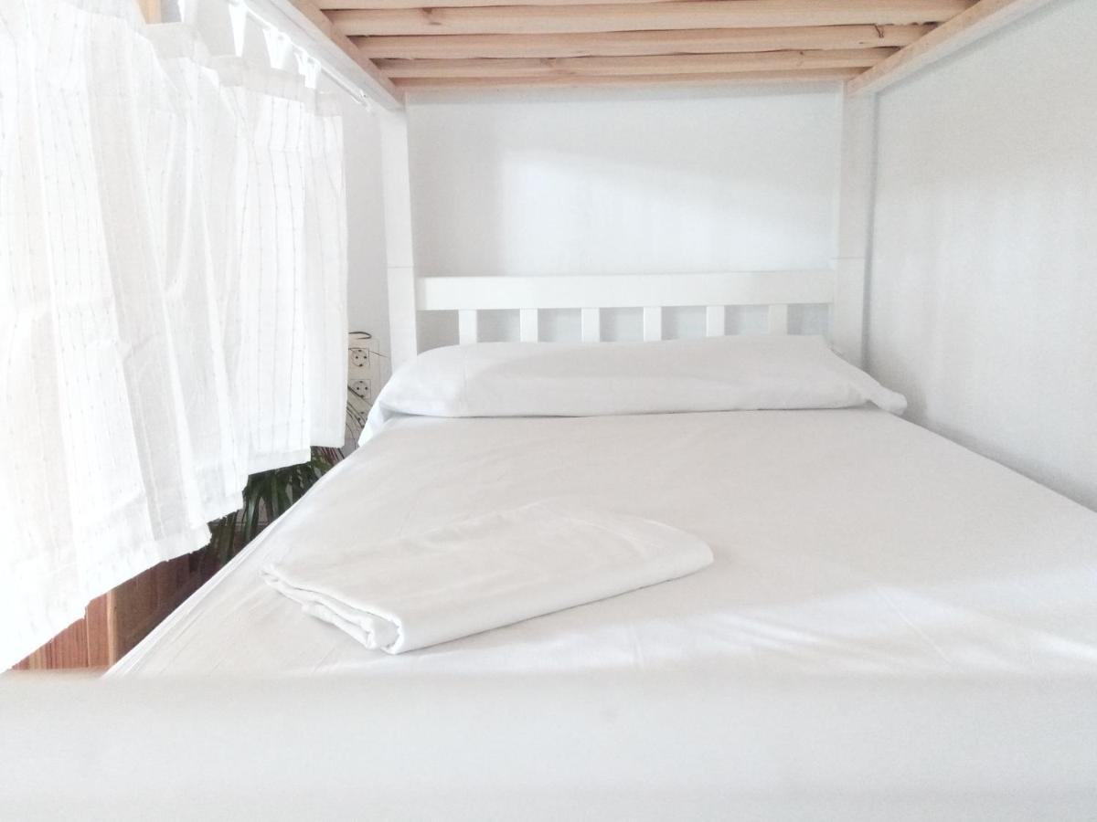 Cama individual en habitación compartida