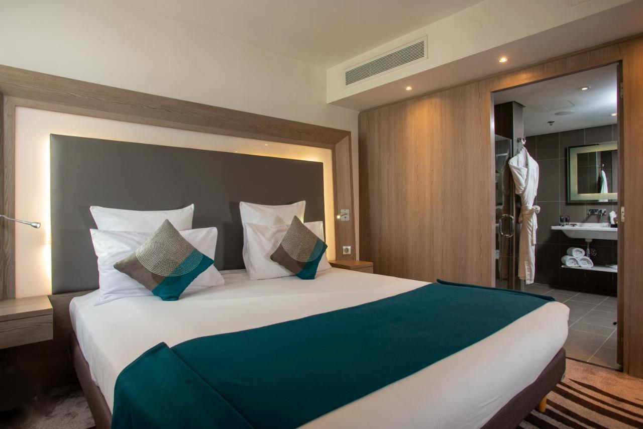 Suite met Kingsize Bed en Bank