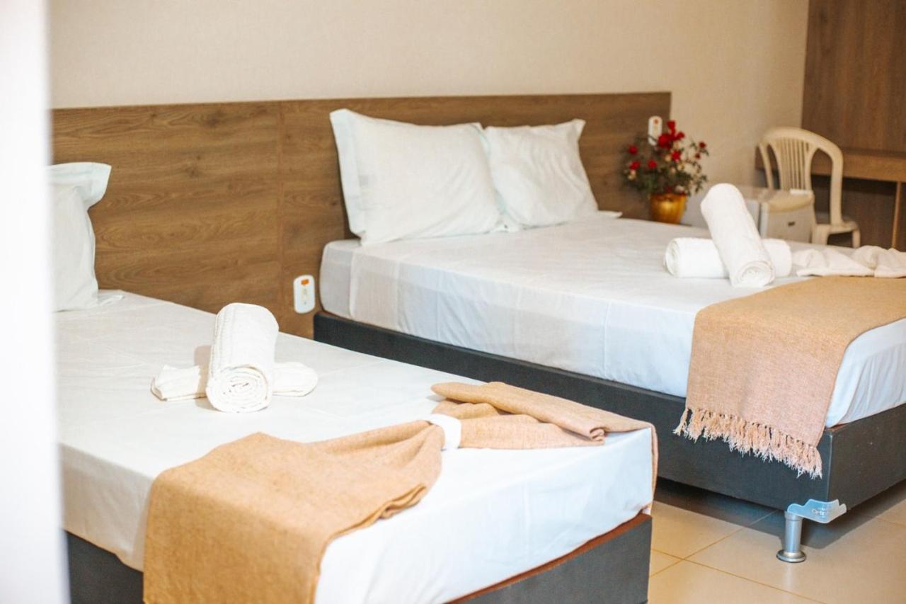 Quarto Triplo com Vista para a Piscina