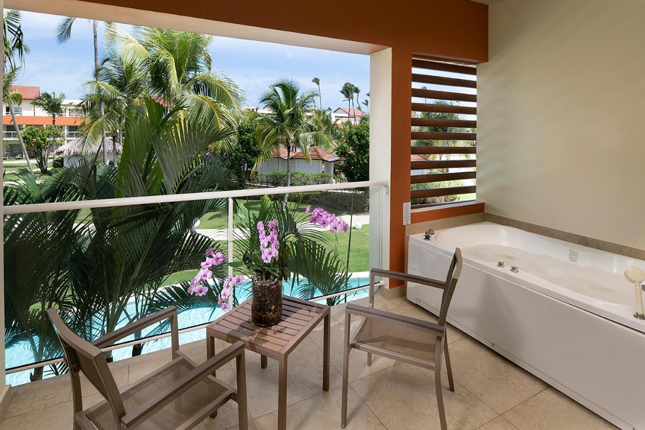 Suite Junior Allure con vistas a la piscina y cama extragrande