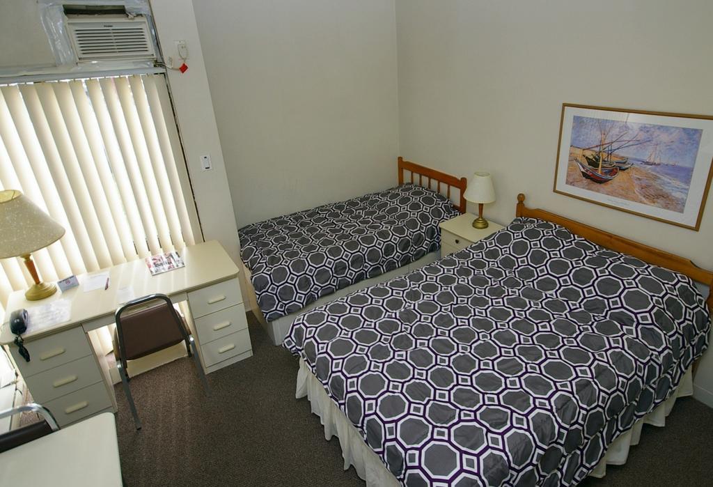 Chambre Lit Double et Lit Simple