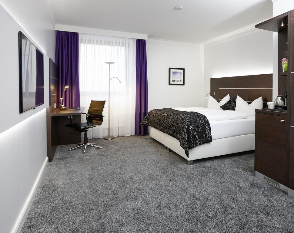 Doppelzimmer mit Kingsize-Bett