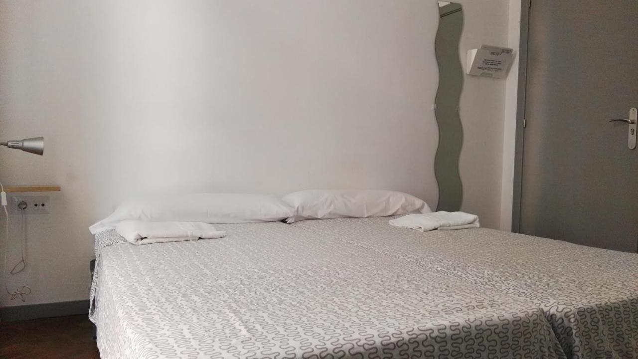 Quarto Triplo com Casa de Banho Partilhada