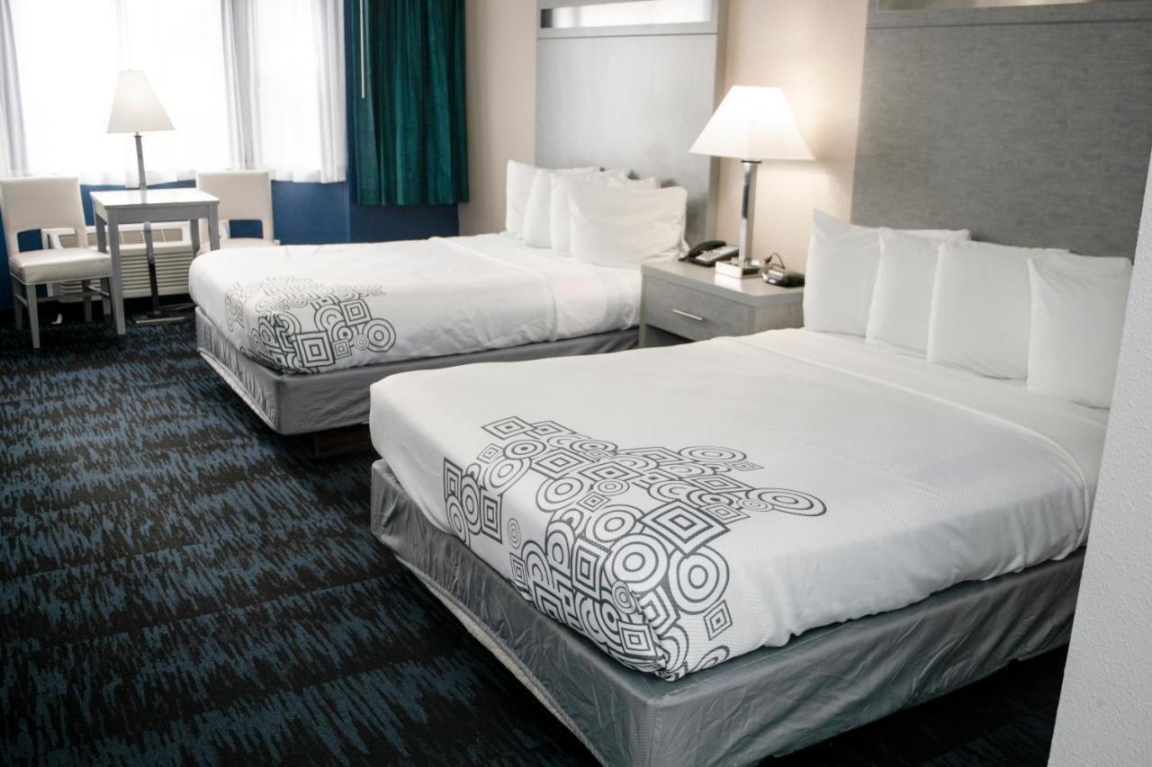 Queen Suite Two Queen Beds & Sofa Bed