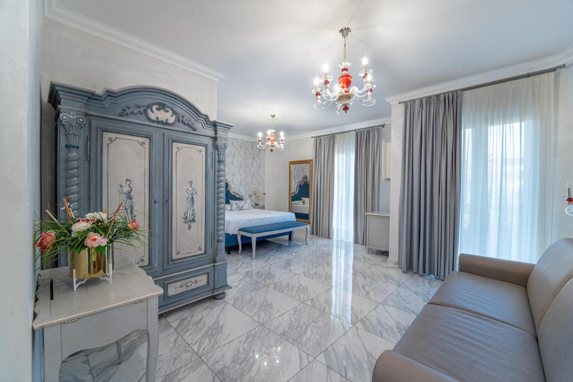 Deluxe Quadruple Room Balcony