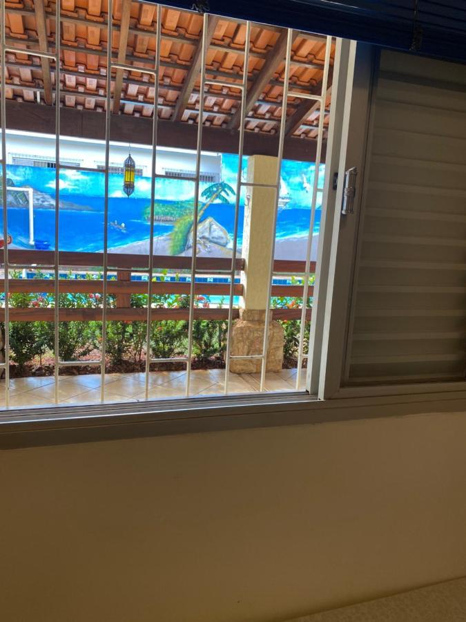 Quarto Triplo com Banheiro Privativo