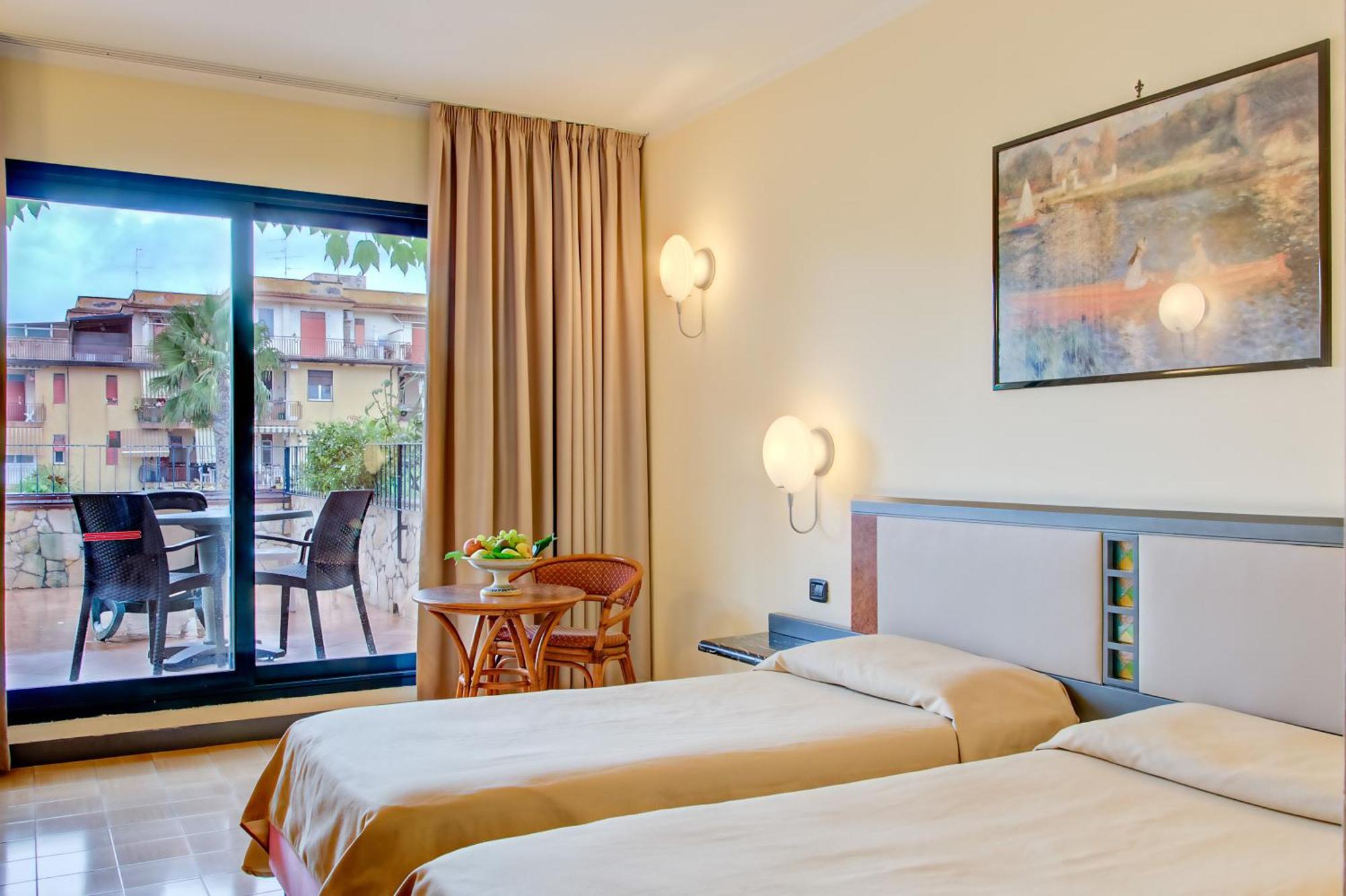 Luxe Kamer met 1 of 2 Bedden en Balkon
