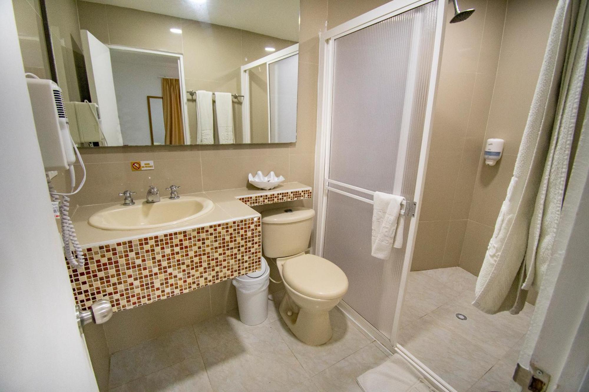 Habitación Triple Estándar con vistas al jardín