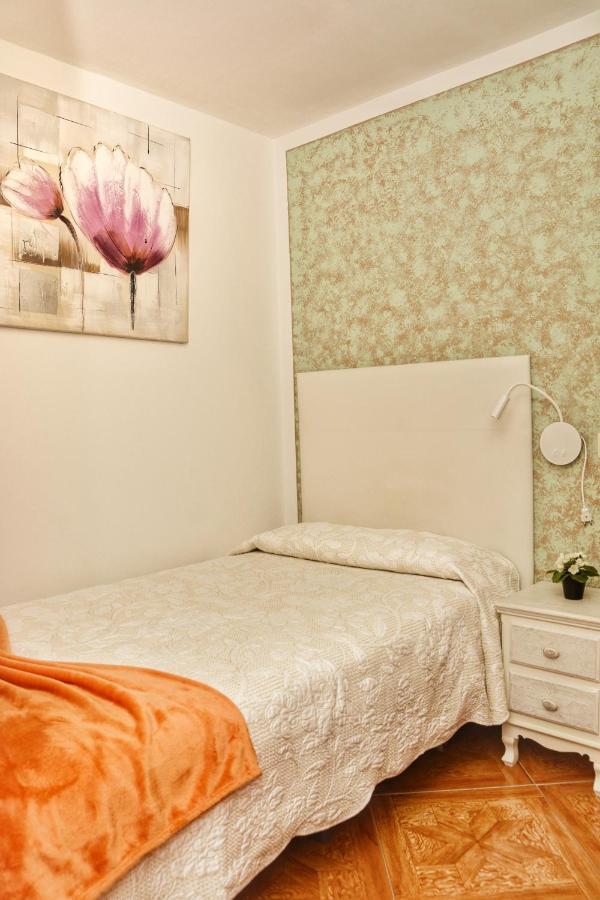 Quarto Individual com Casa de Banho
