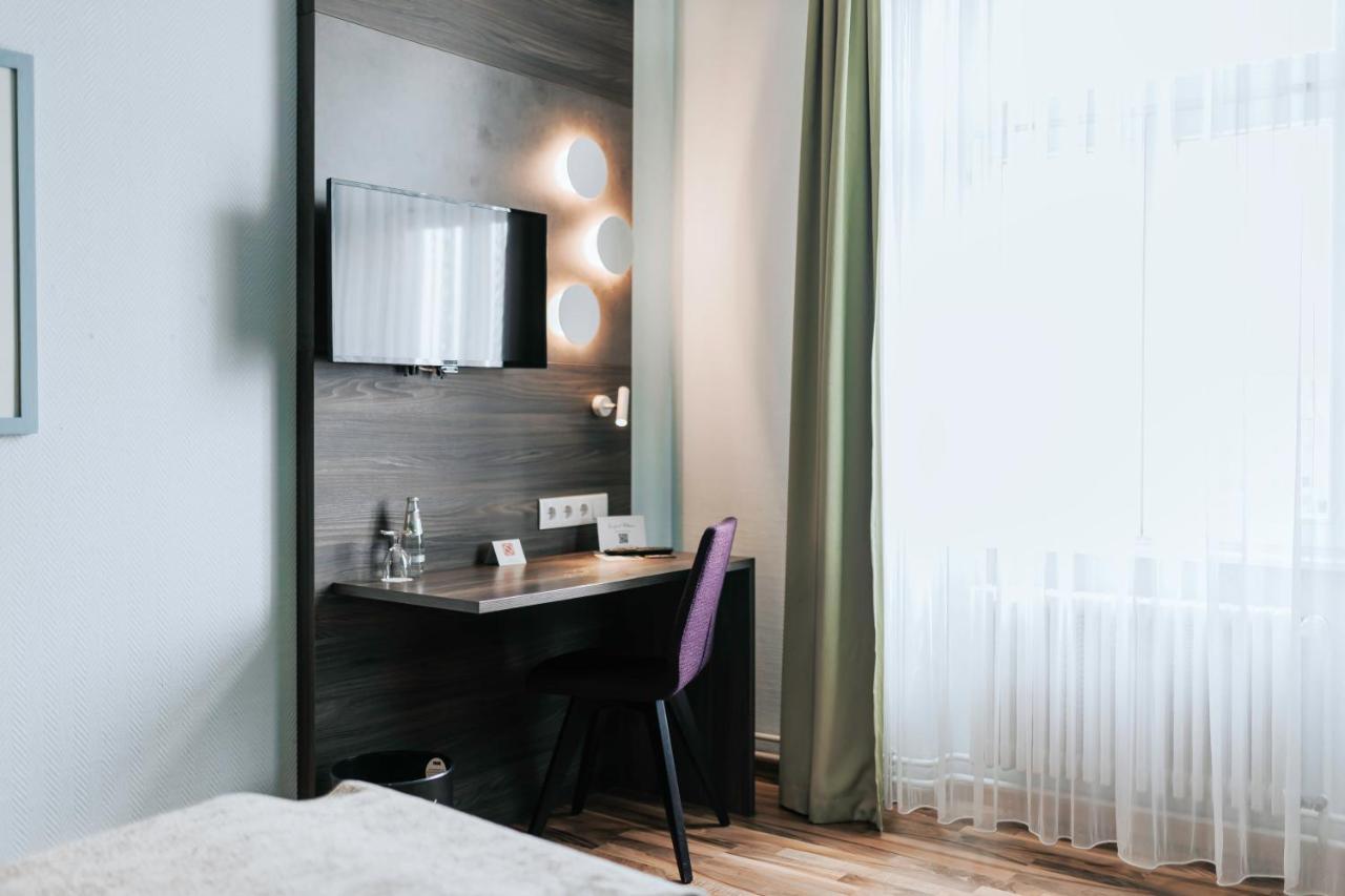 Kamer met Kingsize Bed en Uitzicht op de Stad