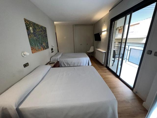 Habitación Cuádruple - vistas al jardín