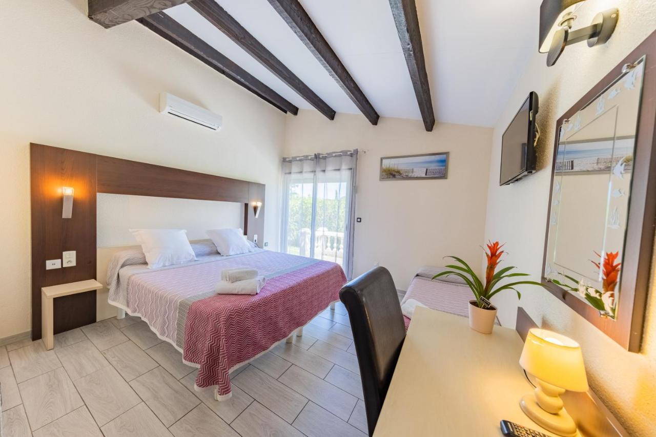 Triple Room Terrace heated swimming pool