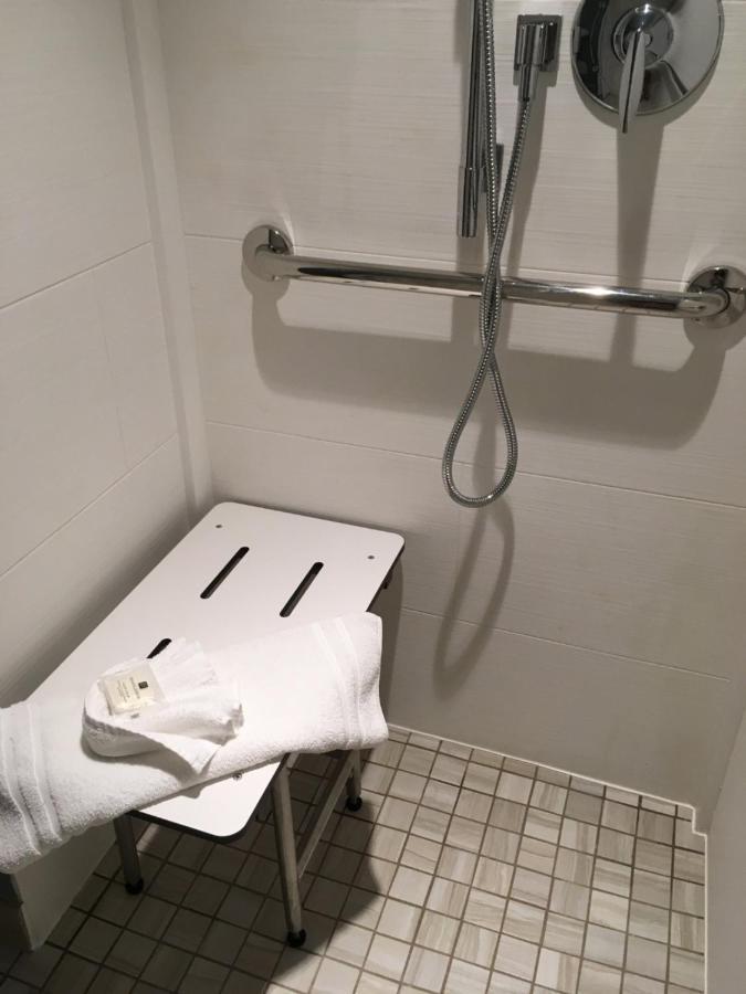 Standard Queen Room Roll Shower Communications Accessible