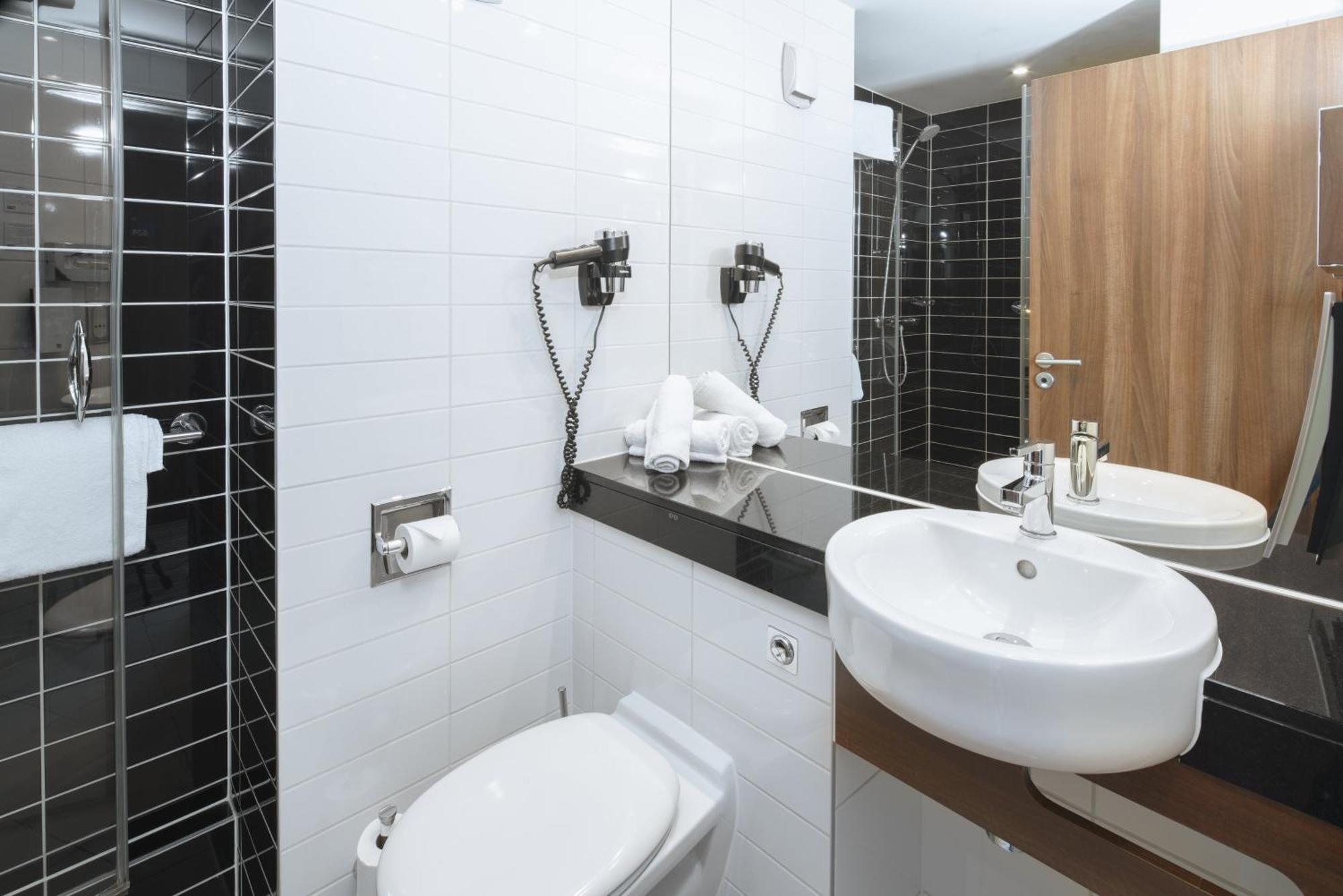 Standaard Kamer met Queensize Bed en Slaapbank