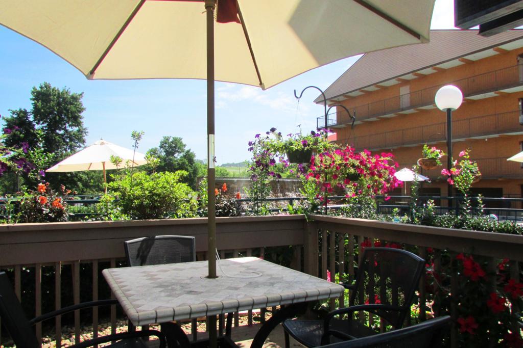 Junior Suite with King Bed, Sofa Bed, Fireplace, Two Vanities, Jet Tub and Share