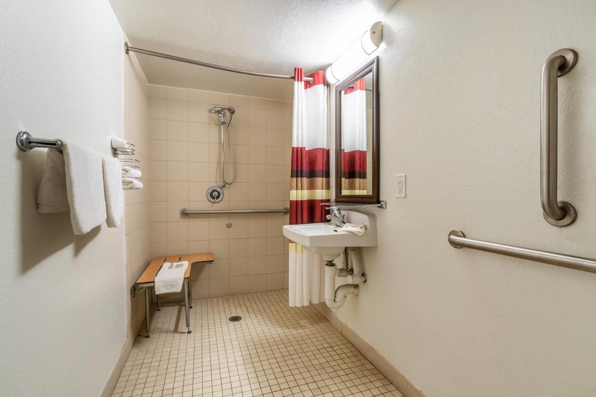Deluxe Room Two Double Beds Disability Access Roll Shower Non-Smoking