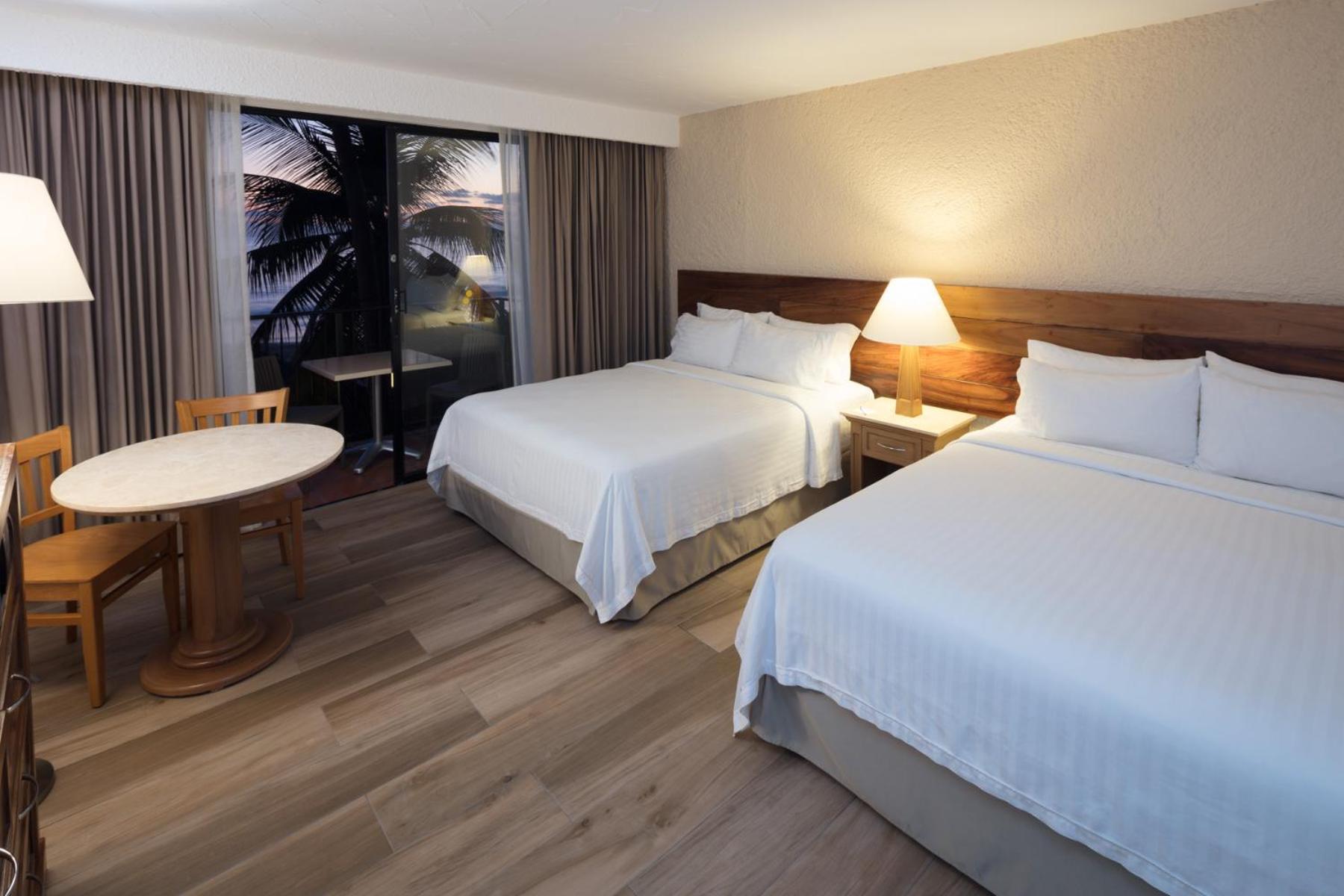 Standard Double Room Two Double Beds Garden View