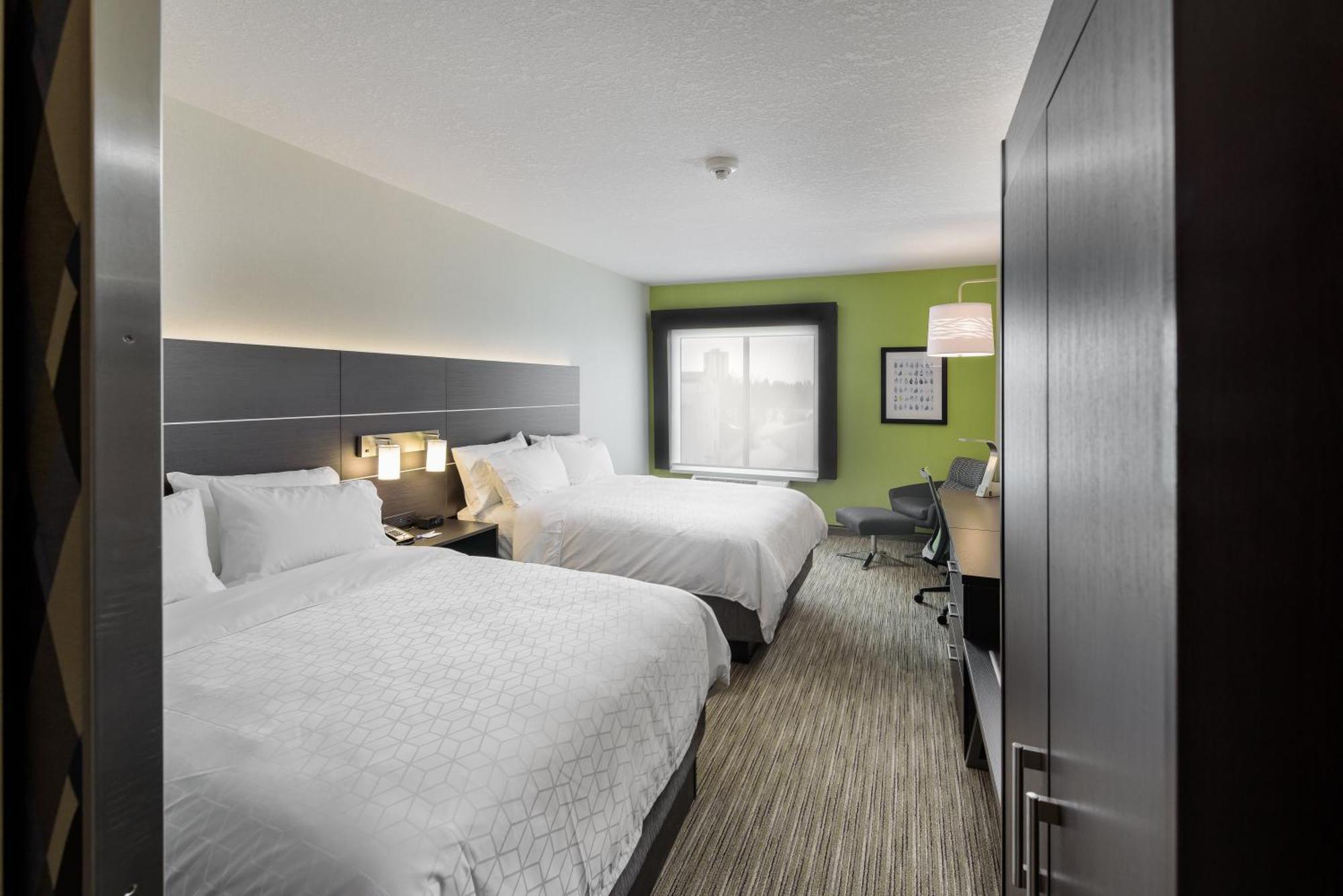 Queen Suite with Two Queen Beds and Sofa Bed