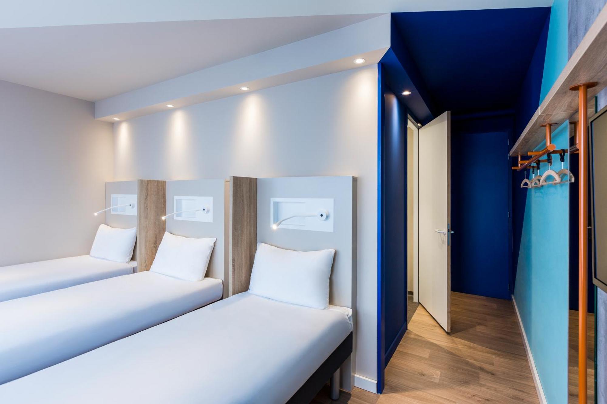 Room Three Single Beds