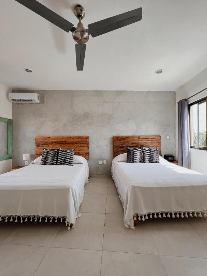 Quarto Duplo com 2 Camas de Casal