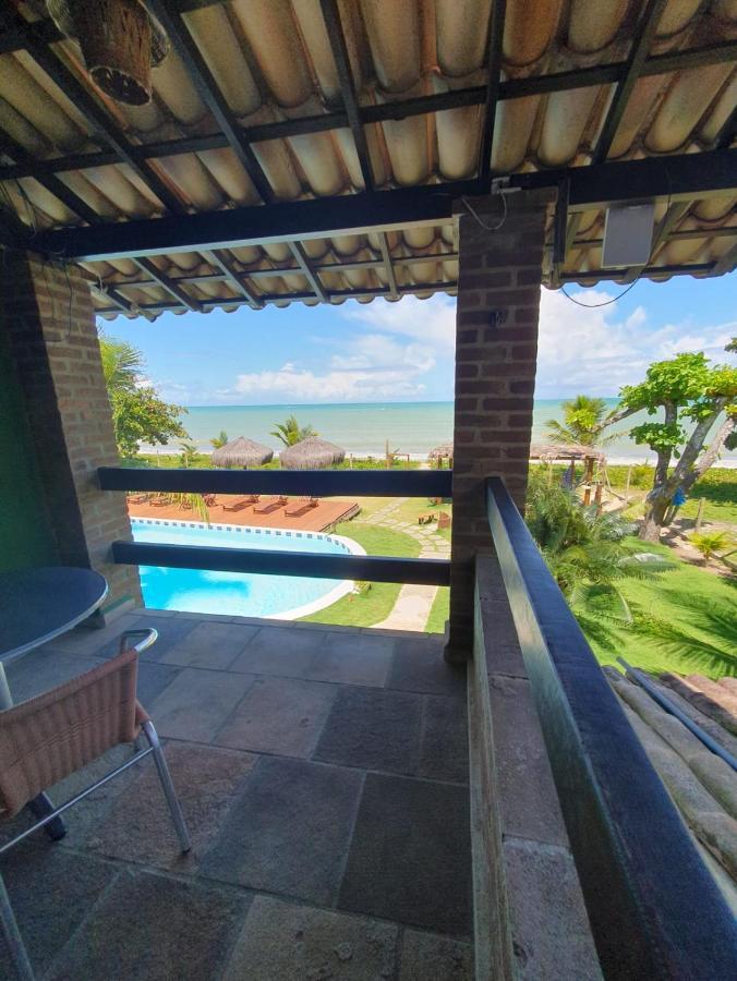 Quarto Quádruplo com Vista do Mar.