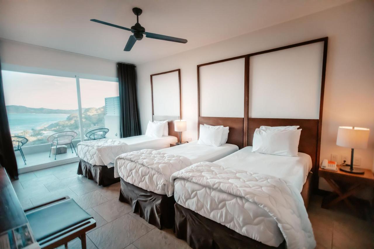 Concept Twin Room with Three Twin Beds and Ocean View - Non-Smoking,1351489360:JPEG