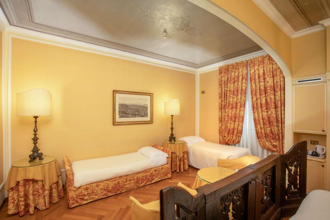 Standard Family Room with One Queen Bed and Two Single Beds - Non-Smoking,1352664238:JPEG