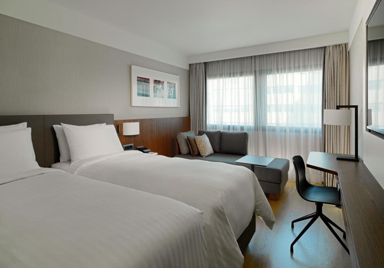 Superior Guest Room Two Single Beds Courtyard View