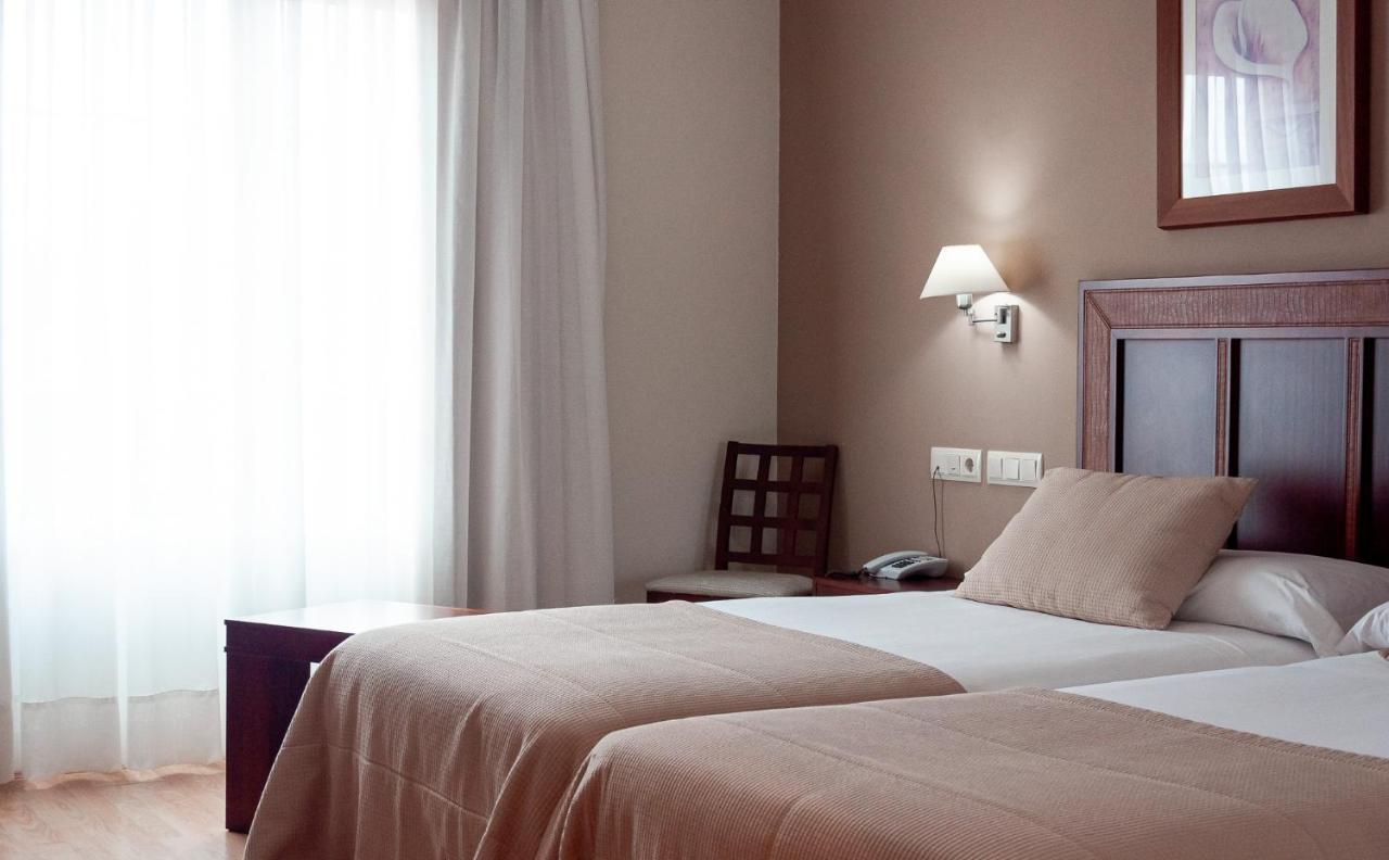 Two Beds Double Room