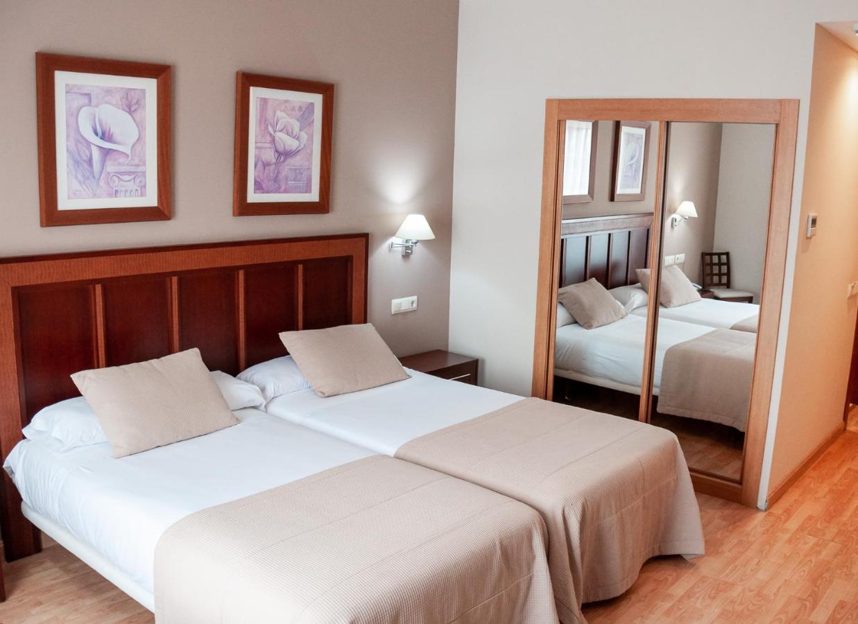Two Beds Double Room