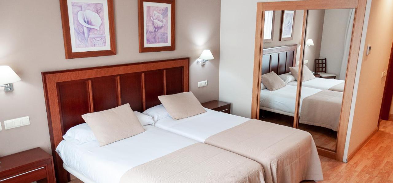 Two Beds Double Room
