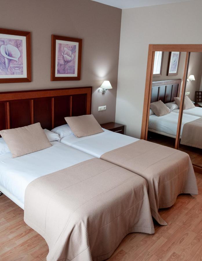 Two Beds Double Room
