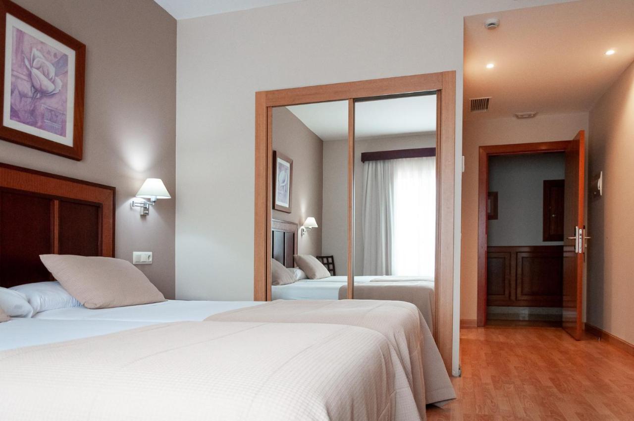 Two Beds Double Room