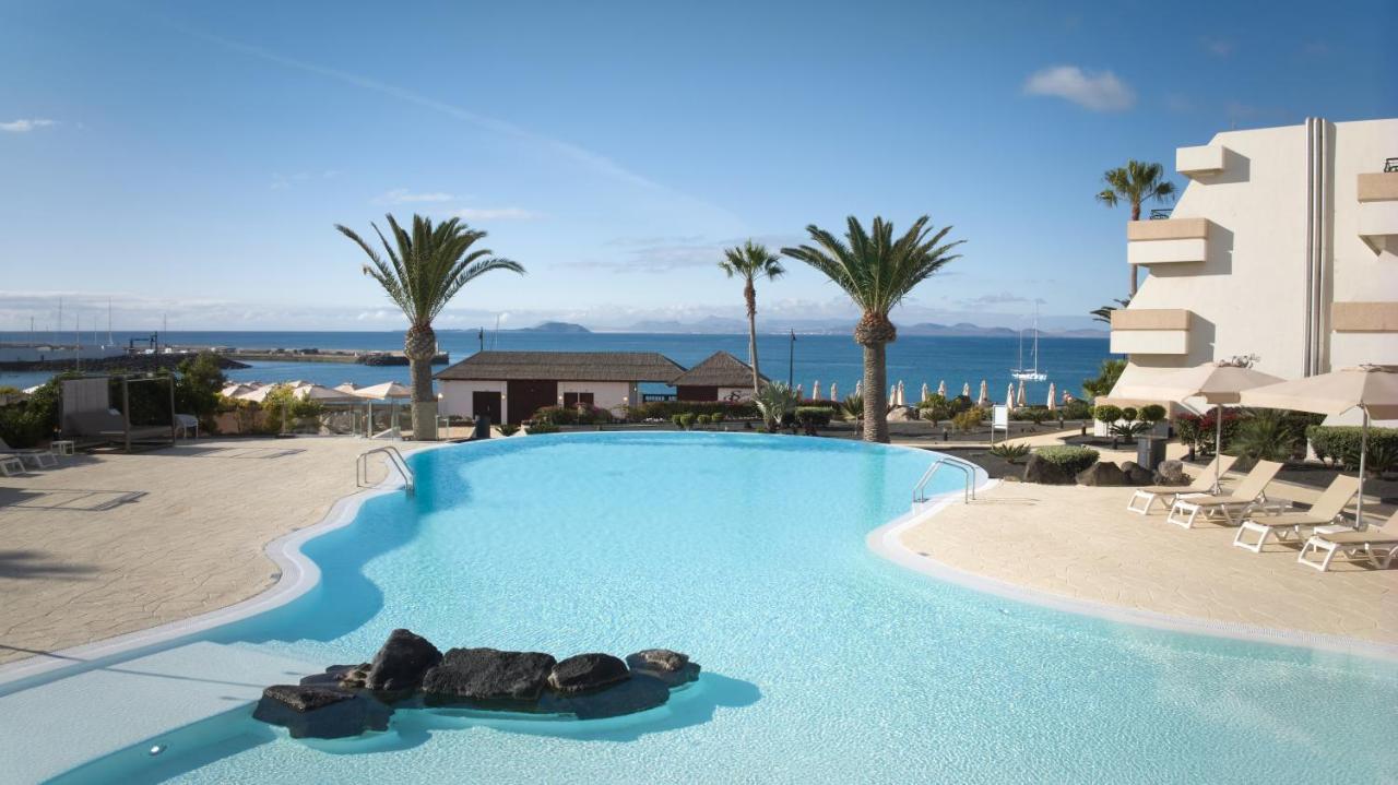 Habitación doble con acceso al club y vistas a la piscina