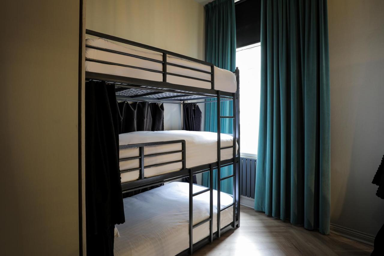 Single Bed a mixed dorm 6 triple bunk shared facilities