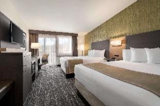 Quadruple Room Two Queen Beds Balcony Non Smoking