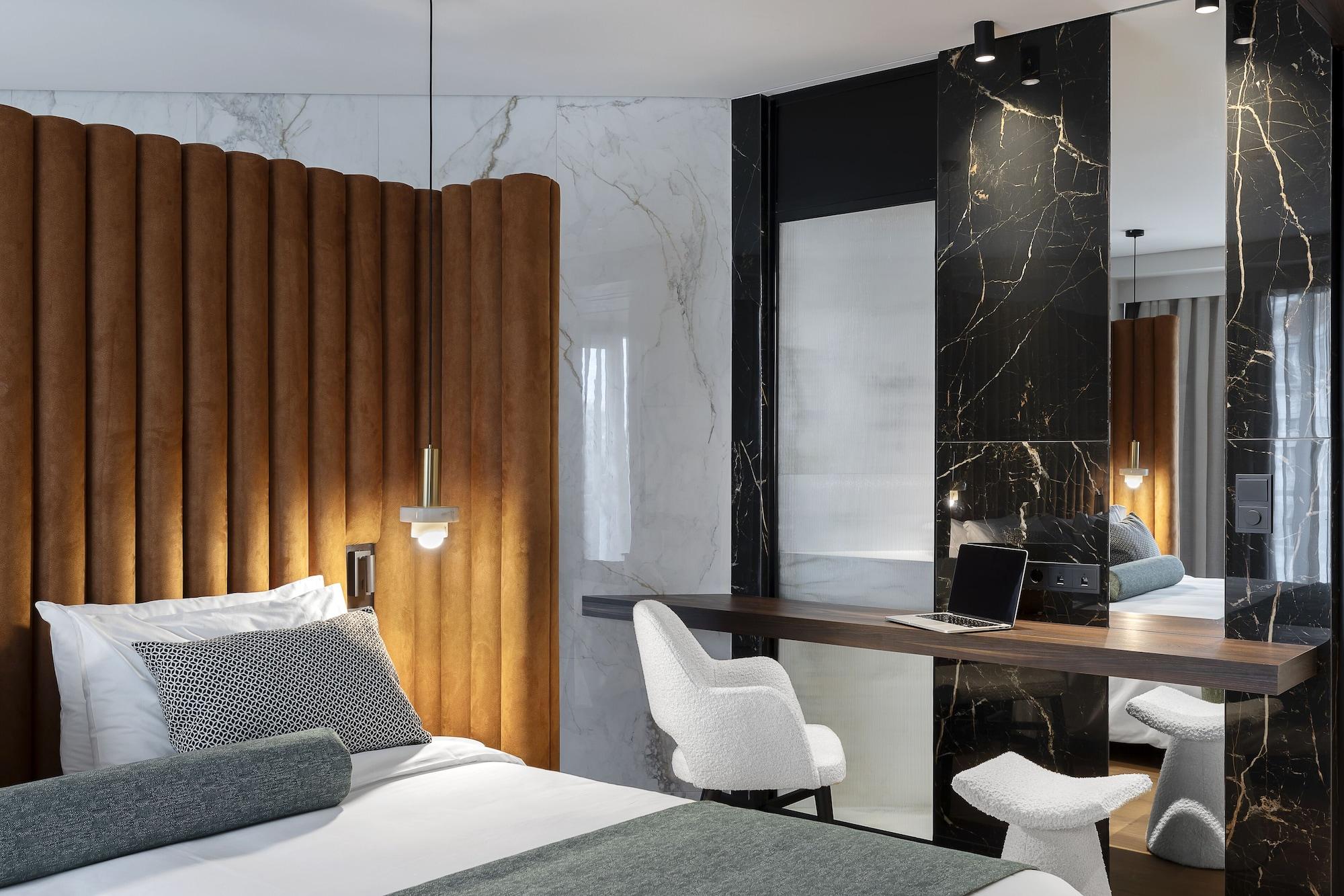 Suite de 1 dormitorio con acceso al salón executive