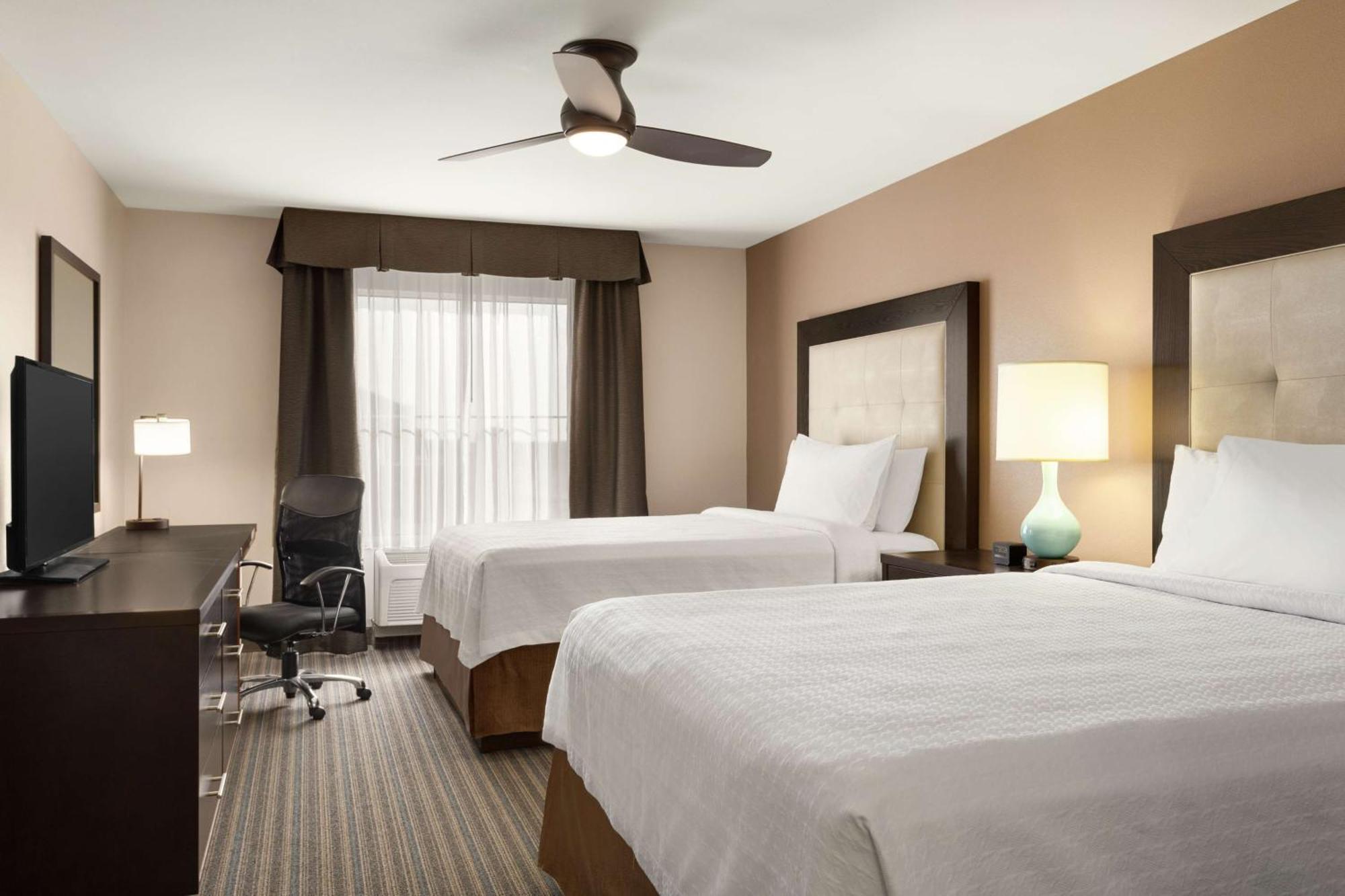 Two Bedroom Suite with One King and Two Queen Beds - Non-Smoking