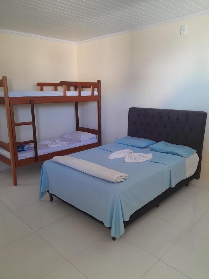 Quarto Deluxe (2 Adultos + 1 Criança)