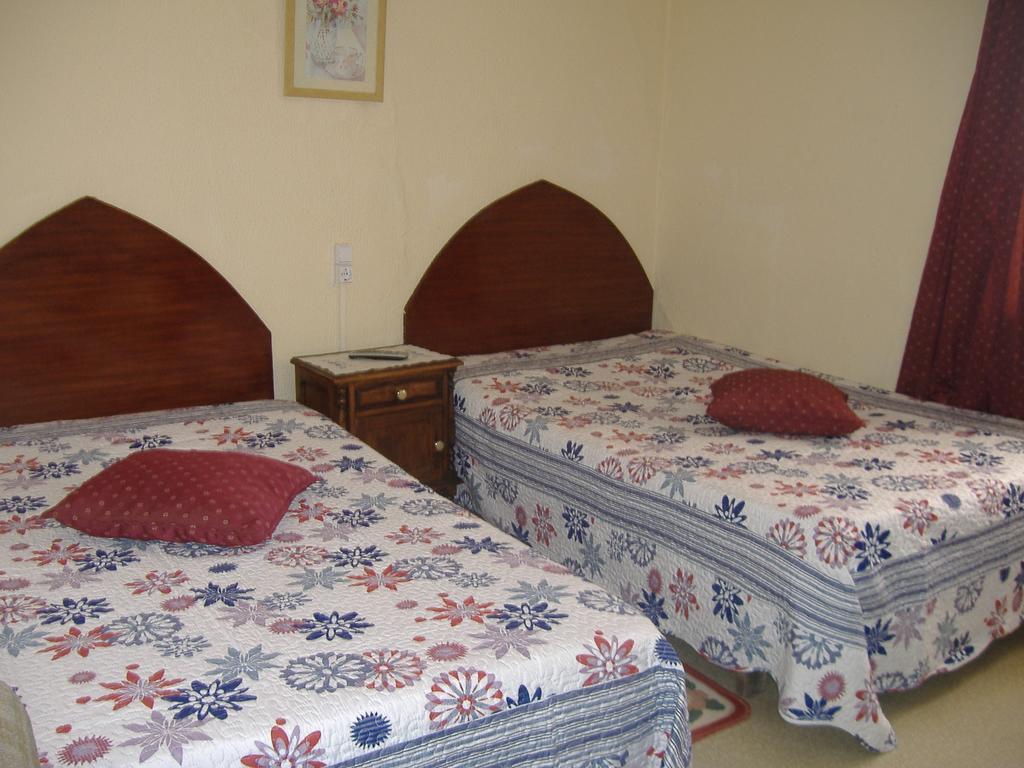 Quarto Duplo
