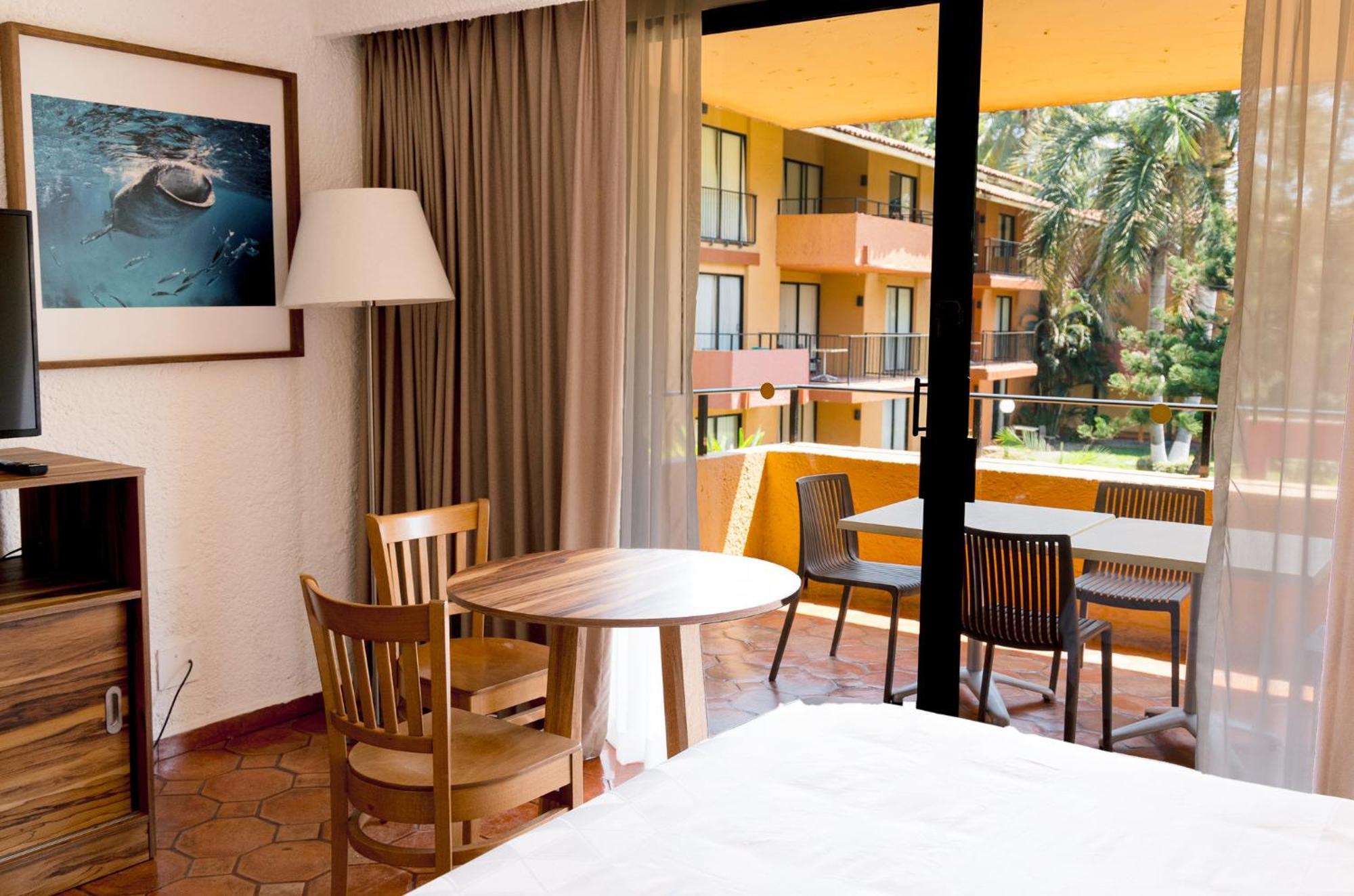 Standard Double Room Two Double Beds Garden View
