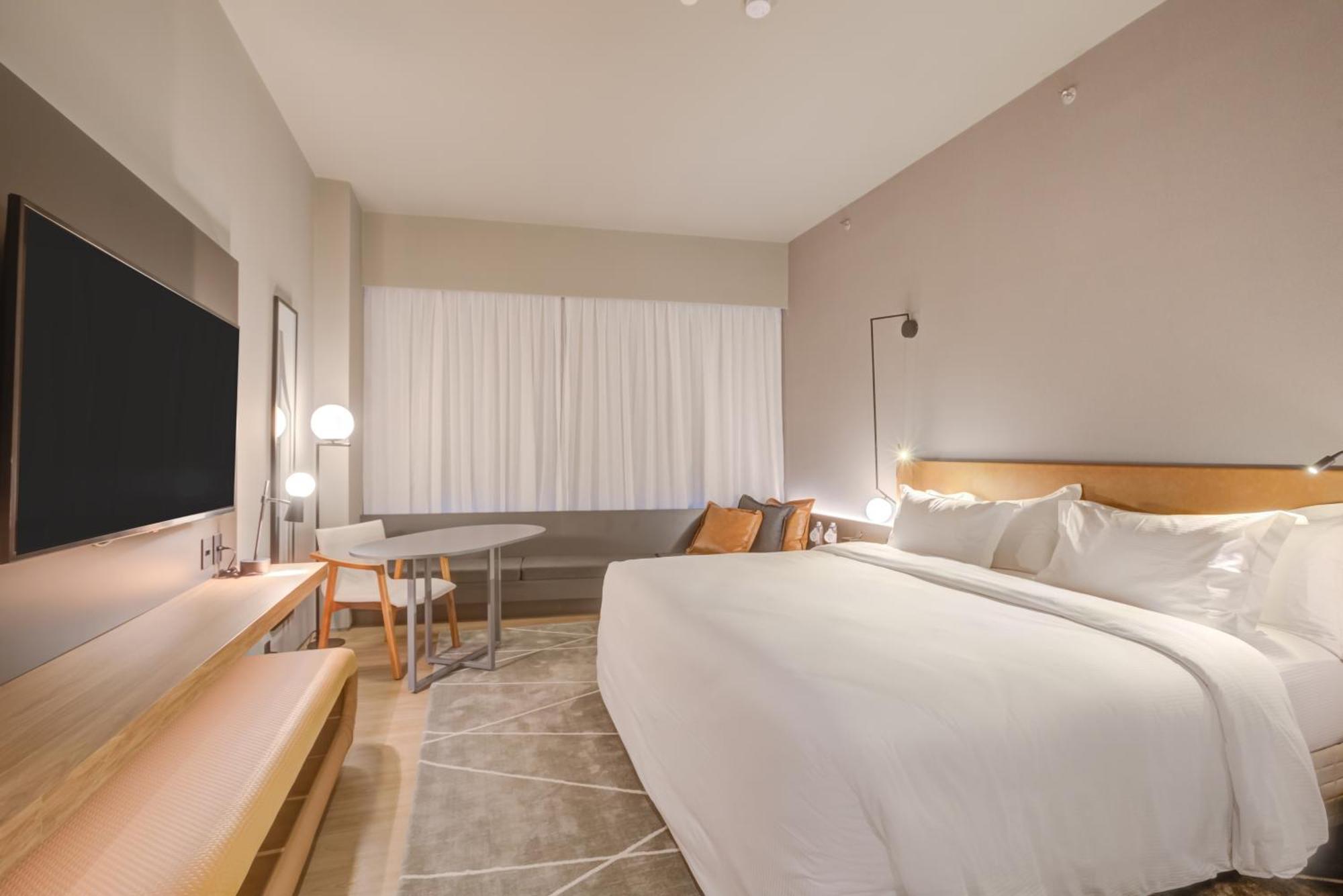Quarto Superior com Cama King-size e Vista