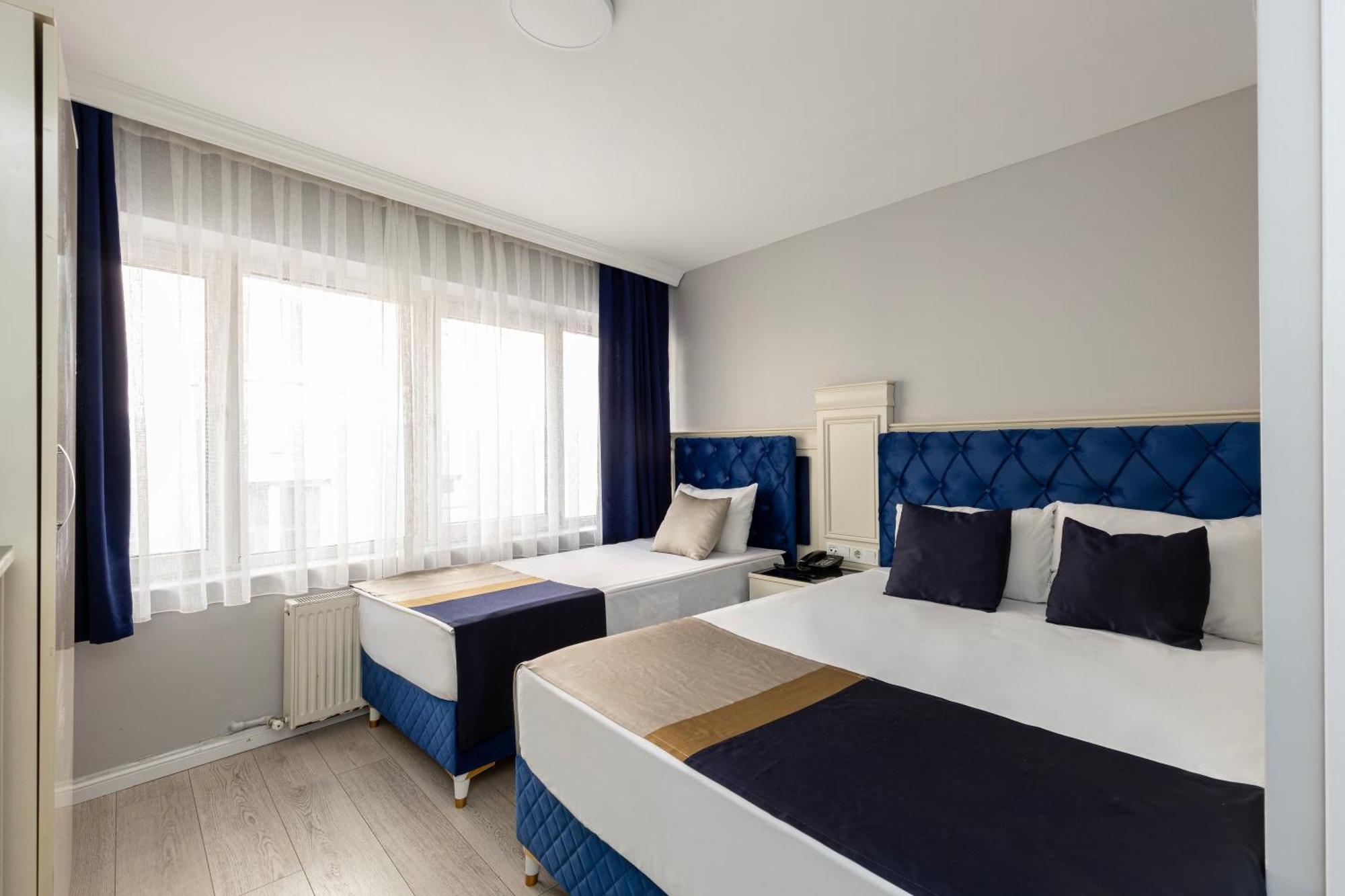Deluxe Triple Room,1525260433:JPEG