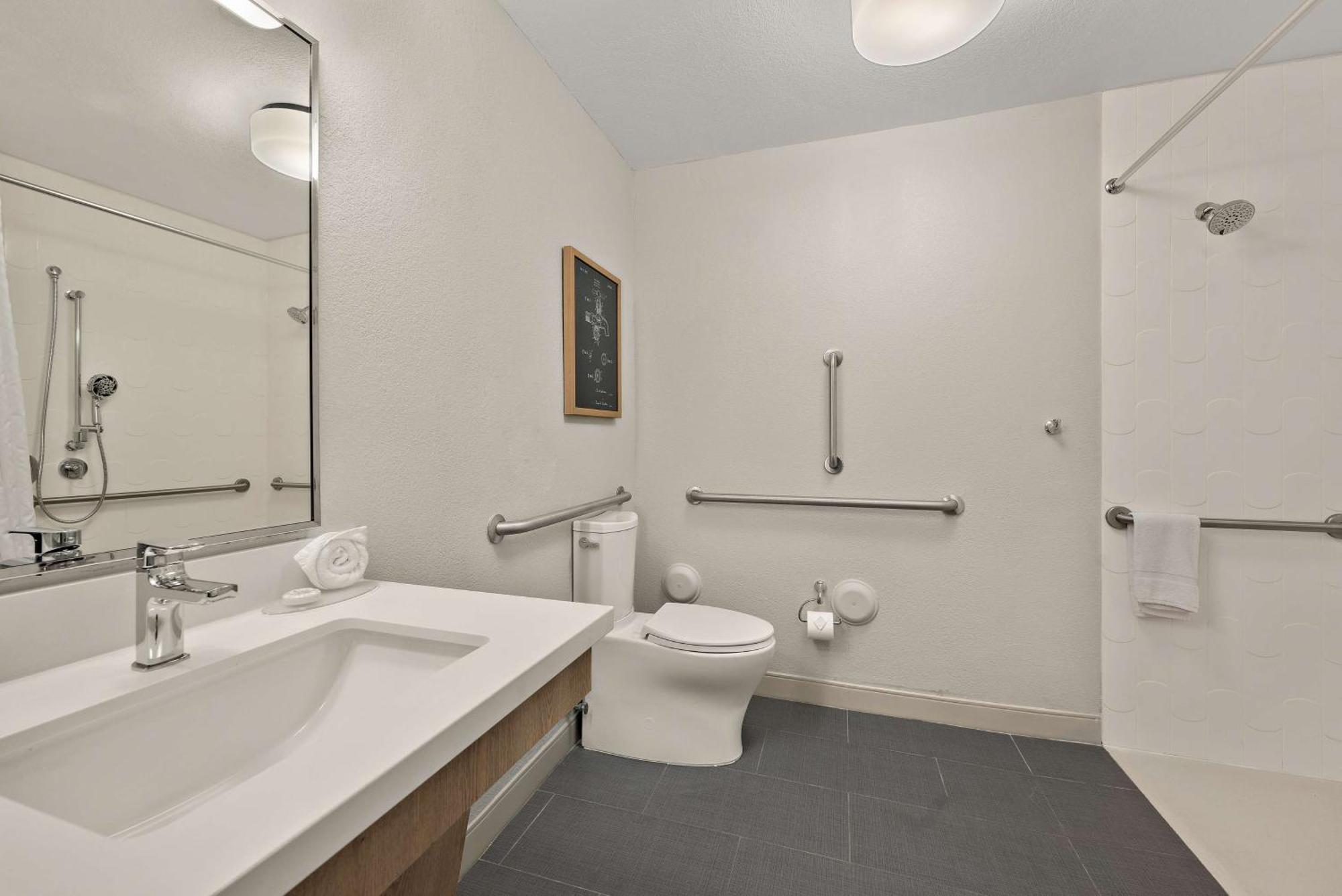 Studio Suite Queen Mobility Accessible Roll Shower