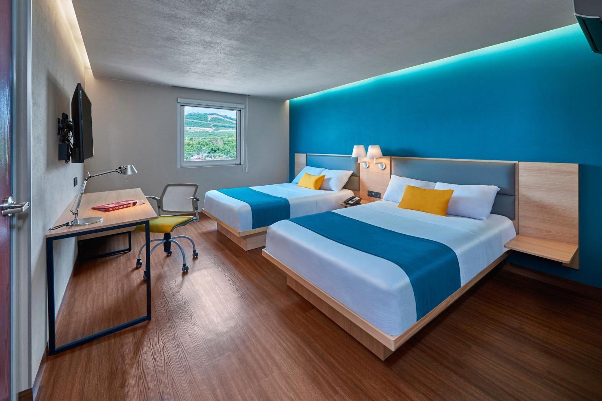 Double Suite with Two Double Beds and Sofa Bed